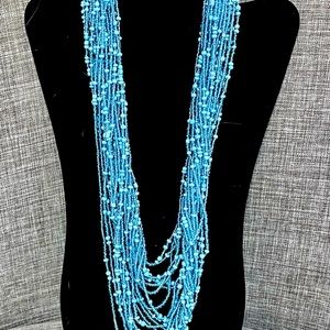 Multi-strand blue bead necklace